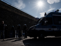 A demonstration takes place in Naples, Italy, outside the Poggioreale prison, where unemployed and working people gather to protest against...