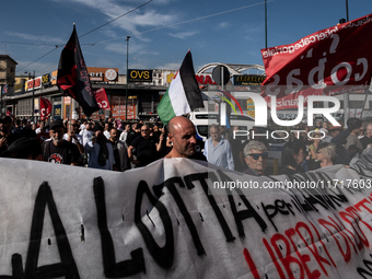 A demonstration takes place in Naples, Italy, outside the Poggioreale prison, where unemployed and working people gather to protest against...