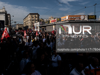 A demonstration takes place in Naples, Italy, outside the Poggioreale prison, where unemployed and working people gather to protest against...