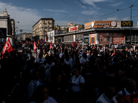 A demonstration takes place in Naples, Italy, outside the Poggioreale prison, where unemployed and working people gather to protest against...