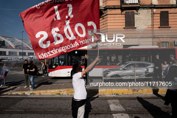 A demonstration takes place in Naples, Italy, outside the Poggioreale prison, where unemployed and working people gather to protest against...