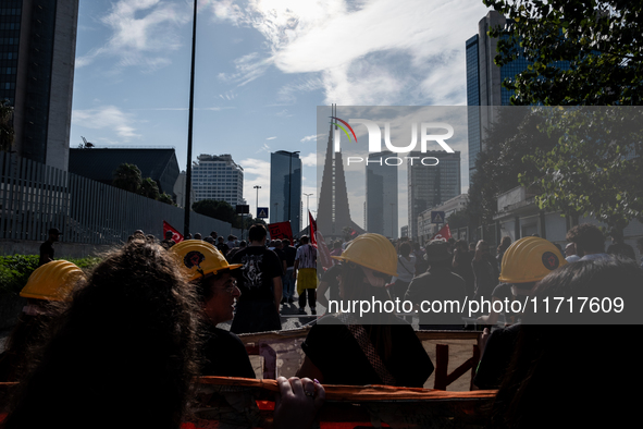 A demonstration takes place in Naples, Italy, outside the Poggioreale prison, where unemployed and working people gather to protest against...