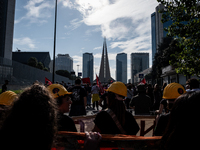 A demonstration takes place in Naples, Italy, outside the Poggioreale prison, where unemployed and working people gather to protest against...