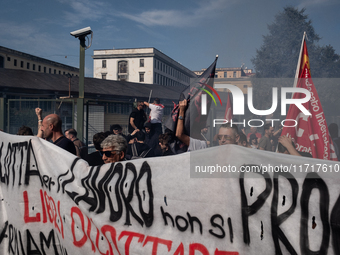 A demonstration takes place in Naples, Italy, outside the Poggioreale prison, where unemployed and working people gather to protest against...