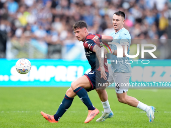 Andrea Pinamonti of Genoa CFC and Gil Patric of SS Lazio compete for the ball during the Serie A Enilive match between SS Lazio and Genoa CF...