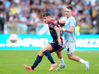 Andrea Pinamonti of Genoa CFC and Gil Patric of SS Lazio compete for the ball during the Serie A Enilive match between SS Lazio and Genoa CF...