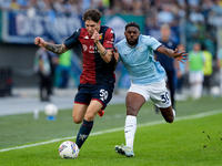 Alessandro Zanoli of Genoa CFC and Nuno Tavares of SS Lazio compete for the ball during the Serie A Enilive match between SS Lazio and Genoa...