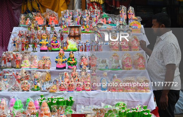 People Buy Hindu Goddess Lakshmi Idols And Other Dolls For Worship During The Upcoming Hindu Festival Diwali, The Hindu Festival Of Lights O...