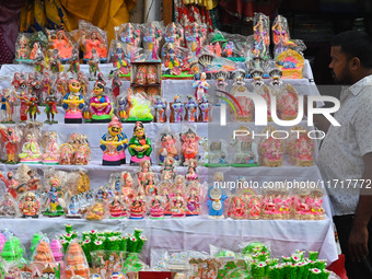 People Buy Hindu Goddess Lakshmi Idols And Other Dolls For Worship During The Upcoming Hindu Festival Diwali, The Hindu Festival Of Lights O...