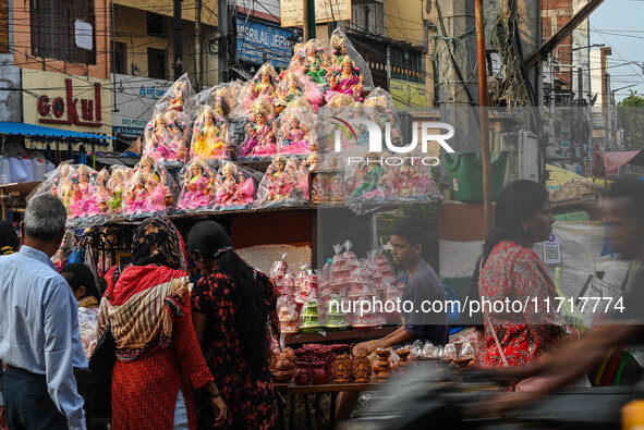 People Buy Hindu Goddess Lakshmi Idols And Other Dolls For Worship During The Upcoming Hindu Festival Diwali, The Hindu Festival Of Lights O...