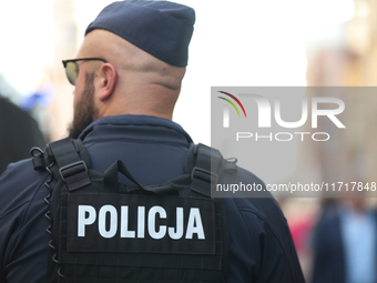 Police participate in a protest against the suspension of asylum law  at the Main Square in Krakow, Poland, on October 27, 2024. The new mig...