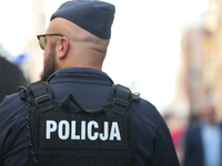 Police participate in a protest against the suspension of asylum law  at the Main Square in Krakow, Poland, on October 27, 2024. The new mig...