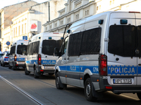 Police walk through the streets of the city during the protest against the suspension of asylum law  in Krakow, Poland, on October 27, 2024....