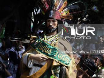 An image of Saint Jude Thaddeus is seen on October 28, 2024, outside the Church of San Hipolito in Mexico City, Mexico, where a large number...