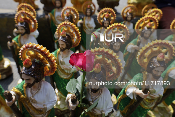 Images of Saint Jude Thaddeus are viewed on Monday, October 28, 2024, outside the Church of San Hipolito in Mexico City, Mexico, where a lar...