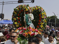 View of an image of Saint Jude Thaddeus outside the Church of San Hipolito in Mexico City, Mexico, on October 28, 2024. A large number of pe...