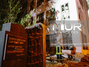 A monument to Kharkiv residents, victims of Nazi persecution, stands next to the damaged building , on October 28, 2024, In The Center Of Kh...