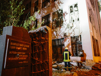 A monument to Kharkiv residents, victims of Nazi persecution, stands next to the damaged building , on October 28, 2024, In The Center Of Kh...