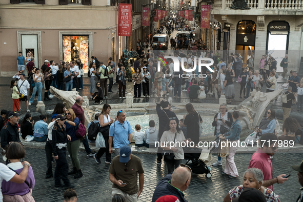 View of Piazza di Spagna with tourists on an autumn day in Rome, Italy, on October 28, 2024. 