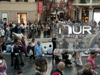 View of Piazza di Spagna with tourists on an autumn day in Rome, Italy, on October 28, 2024. (