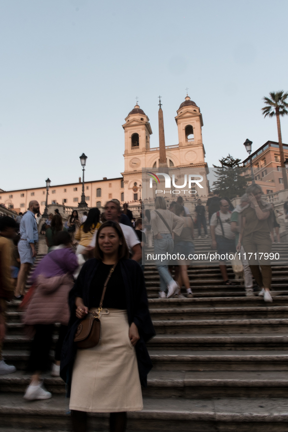 View of Piazza di Spagna with tourists on an autumn day in Rome, Italy, on October 28, 2024. 