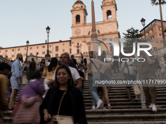 View of Piazza di Spagna with tourists on an autumn day in Rome, Italy, on October 28, 2024. (