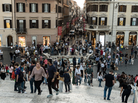 View of Piazza di Spagna with tourists on an autumn day in Rome, Italy, on October 28, 2024. (