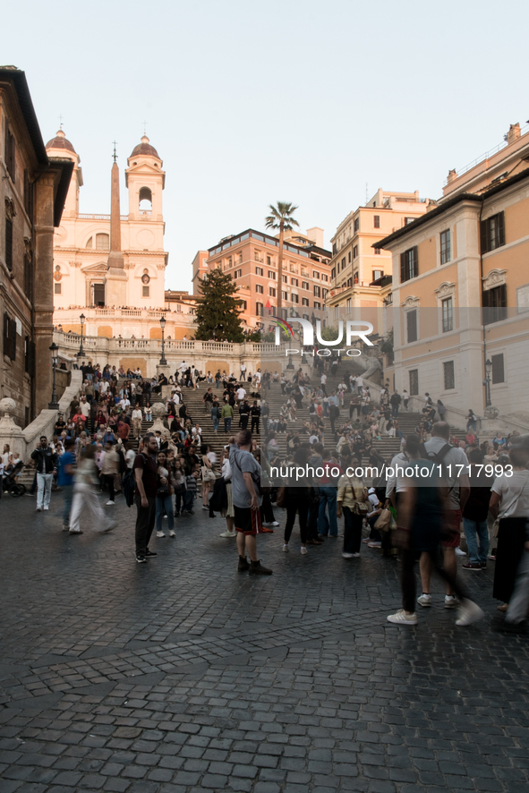 View of Piazza di Spagna with tourists on an autumn day in Rome, Italy, on October 28, 2024. 