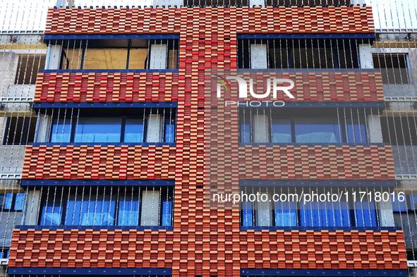 The exterior walls of several buildings on the south bank of Tangdao Bay in the West Coast New District of Qingdao, China, on October 28, 20...