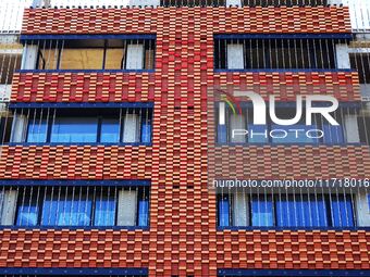 The exterior walls of several buildings on the south bank of Tangdao Bay in the West Coast New District of Qingdao, China, on October 28, 20...