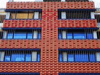 The exterior walls of several buildings on the south bank of Tangdao Bay in the West Coast New District of Qingdao, China, on October 28, 20...