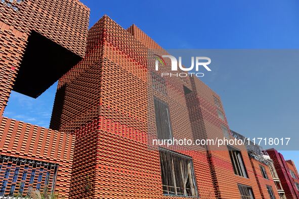 The exterior walls of several buildings on the south bank of Tangdao Bay in the West Coast New District of Qingdao, China, on October 28, 20...