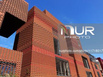 The exterior walls of several buildings on the south bank of Tangdao Bay in the West Coast New District of Qingdao, China, on October 28, 20...