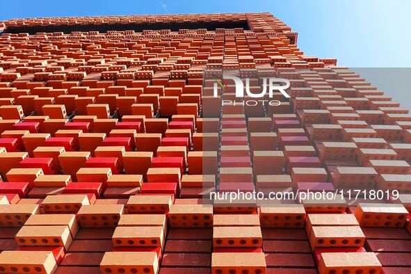 The exterior walls of several buildings on the south bank of Tangdao Bay in the West Coast New District of Qingdao, China, on October 28, 20...