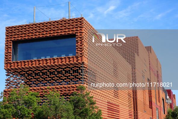 The exterior walls of several buildings on the south bank of Tangdao Bay in the West Coast New District of Qingdao, China, on October 28, 20...