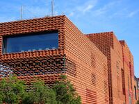 The exterior walls of several buildings on the south bank of Tangdao Bay in the West Coast New District of Qingdao, China, on October 28, 20...