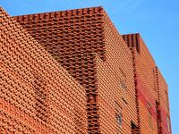 The exterior walls of several buildings on the south bank of Tangdao Bay in the West Coast New District of Qingdao, China, on October 28, 20...