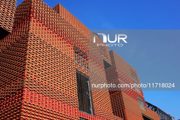 The exterior walls of several buildings on the south bank of Tangdao Bay in the West Coast New District of Qingdao, China, on October 28, 20...