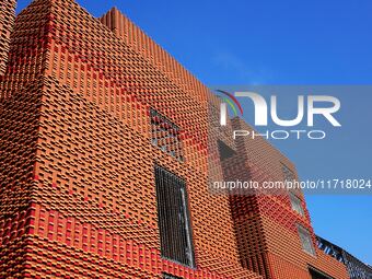 The exterior walls of several buildings on the south bank of Tangdao Bay in the West Coast New District of Qingdao, China, on October 28, 20...