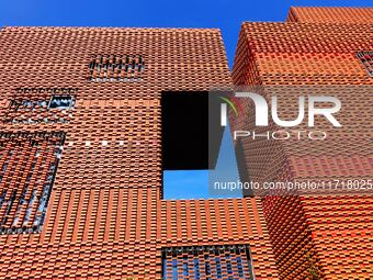 The exterior walls of several buildings on the south bank of Tangdao Bay in the West Coast New District of Qingdao, China, on October 28, 20...