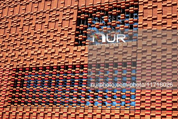 The exterior walls of several buildings on the south bank of Tangdao Bay in the West Coast New District of Qingdao, China, on October 28, 20...