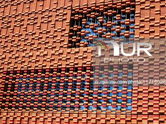 The exterior walls of several buildings on the south bank of Tangdao Bay in the West Coast New District of Qingdao, China, on October 28, 20...