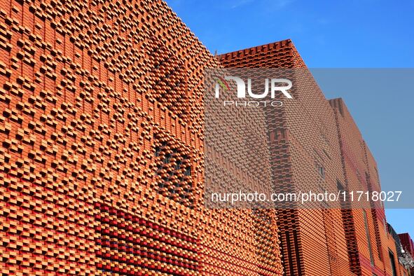 The exterior walls of several buildings on the south bank of Tangdao Bay in the West Coast New District of Qingdao, China, on October 28, 20...