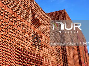 The exterior walls of several buildings on the south bank of Tangdao Bay in the West Coast New District of Qingdao, China, on October 28, 20...