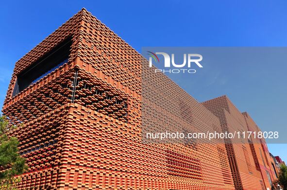 The exterior walls of several buildings on the south bank of Tangdao Bay in the West Coast New District of Qingdao, China, on October 28, 20...