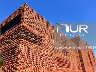 The exterior walls of several buildings on the south bank of Tangdao Bay in the West Coast New District of Qingdao, China, on October 28, 20...