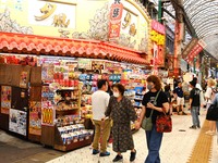 People shop at Heimitsu Shop Street in Naha, Japan, on October 28, 2024. (