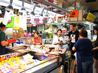 People shop at Heimitsu Shop Street in Naha, Japan, on October 28, 2024. (