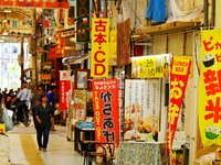 People shop at Heimitsu Shop Street in Naha, Japan, on October 28, 2024. (