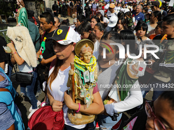 Devotees of Saint St. Jude Thaddeus attend the Church of San Hipolito to bless the images and give thanks for the favors granted in Mexico C...